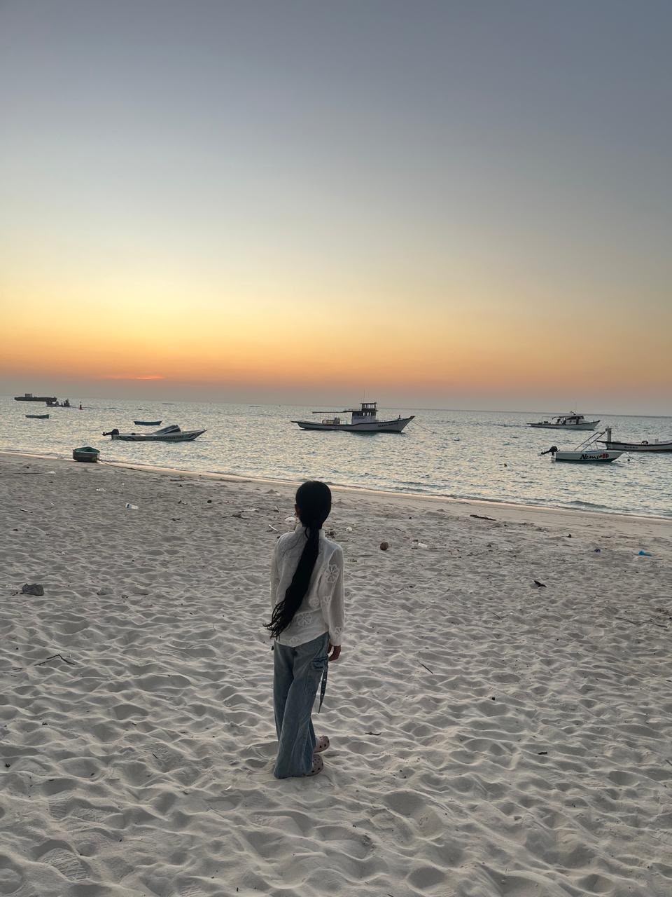 Guest at a sunset beach